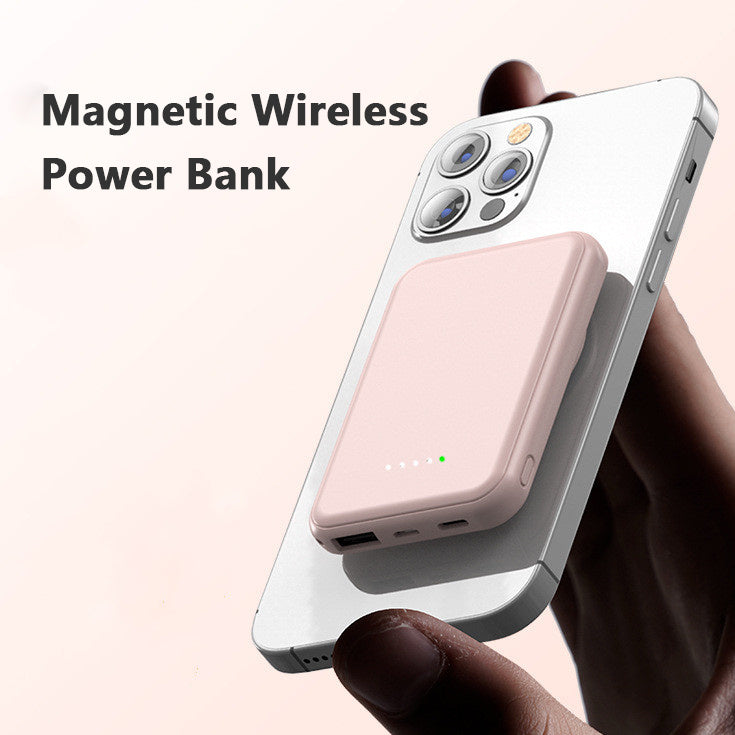 Mini fast charging magnetic wireless power bank attached to smartphone.